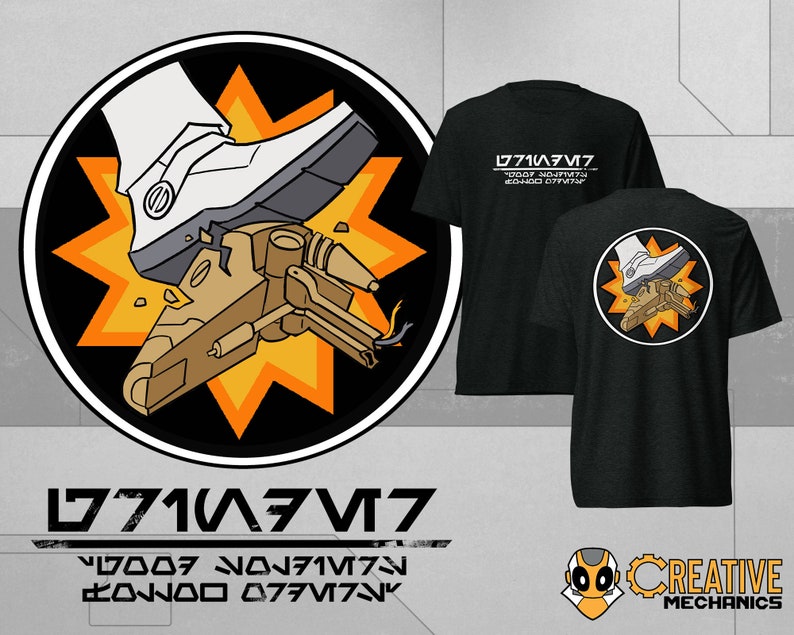 May include: A black t-shirt featuring a white and orange graphic of a boot crushing a robot. The graphic is encircled by a yellow starburst. The text "0771V377" is printed in white on the shirt. The text "V0007 N0771V73N 20N000 0771V73N" is printed in white below the graphic.