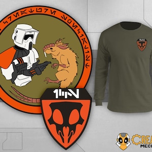 May include: A round, orange and green patch featuring a white and black stormtrooper pointing at a brown rat with red teeth. The patch has the text "11-N" and a series of symbols around the edge. A separate, orange and black patch with a skull design and the text "11-N" is also shown.
