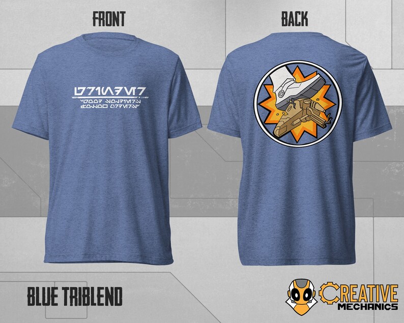 May include: A blue t-shirt with the text "L771A/V7" and "2D007 N017MT9 20400 077V7A" on the front. The back of the shirt features a circular graphic of a white boot stepping on a small spaceship with a yellow starburst.