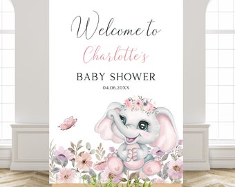 Puede incluir: Bienvenido a la Baby Shower de Charlotte, cartel con una ilustración de acuarela de un lindo elefante gris con una corona floral rosa y sentado en un campo de flores rosas y blancas. La fecha 04.06.20XX está impresa debajo del texto.