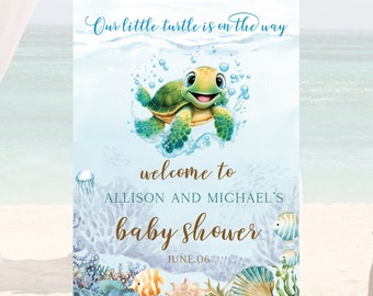 May include: A blue and white welcome sign for a baby shower with a cartoon turtle swimming in the ocean. The sign says "Our little turtle is on the way" and "Welcome to Allison and Michael's Baby Shower June 06".