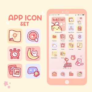 May include: A pink smartphone shows a custom app icon set. The icons include a map, clock, alarm clock, banana with a cat, photos, and a Discord icon. The phone's screen displays the app icons and the text "hello!" on the home screen.