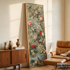 May include: A tall, rectangular framed wall art piece featuring a detailed botanical and avian illustration on a sage green background. The artwork depicts a large white crane, various colorful flowers including pink and red roses, and small birds.