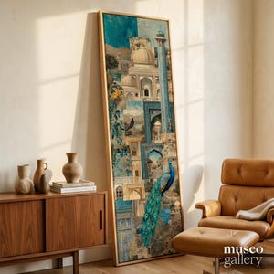 May include: A tall, rectangular framed wall art piece featuring a collage of architectural elements, including domes and arches in shades of teal, gold, and beige. A vibrant peacock with blue and green plumage is prominently displayed in the lower section.