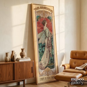 May include: A tall, rectangular framed art print featuring an Art Nouveau style illustration of a figure with wings, titled THE ABSINTHE and L'ONDÉE DES RÊVES PAISIBLES. The artwork uses a palette of cream, red, teal, and brown with ornate borders.