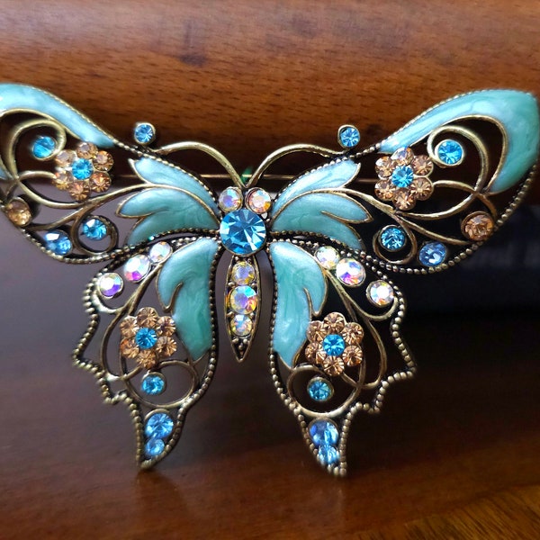 Big Butterfly Brooch Signed NR Nina Ricci for Avon Blue Enamel Gold Toned Filigree with Swarovski Crystals