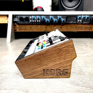Korg volca solid walnut wood ends stand.  Synth NOT INCLUDED