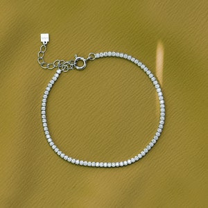 Tiny and shiny tennis bracelet. Sterling silver 925 bracelet with white high carbon diamonds 2 mm. Length 16.5 + 5 cm / 6.5 + 2 inches