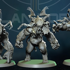 May include: Three gray, detailed, miniature figures of monstrous creatures with wings, claws, and horns. The figures are posed on circular bases.