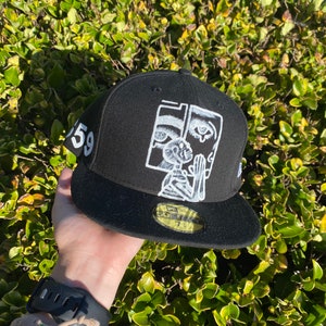 Custom skeleton and album art fitted hat