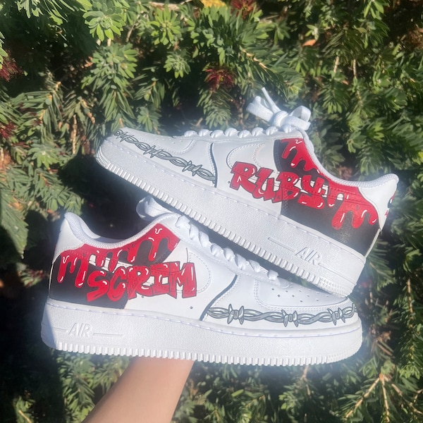 Custom Air Force 1s black and red artist themed