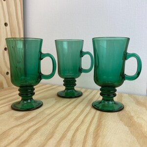 Set of 3 Vintage Green Glass Pedestal Mugs - Mid Century Glassware with Handles, 5.75” Tall - Retro Footed Irish Coffee Mugs - Libbey Glass