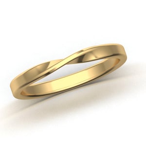 May include: A gold-colored twisted band ring.