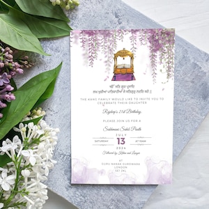 May include: A purple and white invitation card with a floral design and a golden religious symbol. The text on the card reads "ੴ ਸਤਿ ਗੁਰ ਪ੍ਰਸਾਦਿ" and "ਖੁਸ਼ੀਆਂ ਪਾਤਿਸ਼ਾਹੀਆਂ ਜੇ ਸਤਿਗੁਰੁ ਨਦਰਿ ਕਰੋ." The card also includes the text "Rajdeni's 21st Birthday" and "Sakhwant Sakhi Peeth".