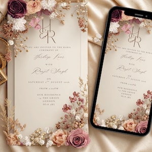 Puede incluir: Una tarjeta de invitación y un teléfono inteligente que muestra el mismo diseño. La tarjeta y la pantalla del teléfono presentan arreglos florales en tonos rosa, crema y burdeos. El texto dice: "Estás invitado a la ceremonia Roka de Hardeep Kaur con Ranjit Singh."