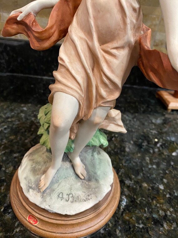 Vintage Italian statue by A. Belcari. Vintage Italian woman statue