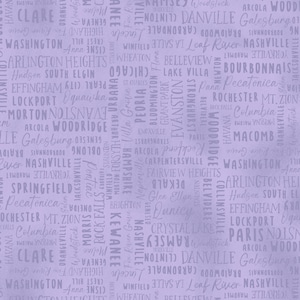 May include: A purple background with a repeating pattern of white text. The text is a list of cities and towns in Illinois. The text is in a handwritten style.