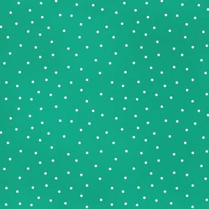 May include: A teal background with a white polka dot pattern.