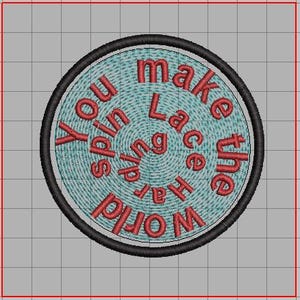 May include: A black and white circular embroidered patch with red text that reads "You spin the world" with the words "make" and "lace" in the center.