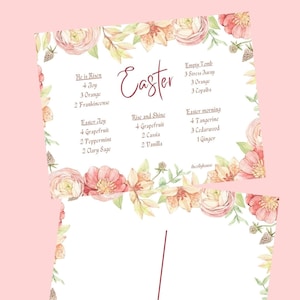 Könnte beinhalten: Eine druckbare Rezeptkarte für ätherische Ölmischungen zu Ostern mit einem floralen Rand. Die Karte listet verschiedene ätherische Ölmischungen für Ostern auf, darunter "He is Risen", "Easter Joy", "Rise and Shine", "Empty Tomb" und "Easter Morning".