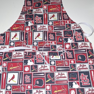 St louis Cardinals apron, handmade linedgrilling  bbq apron, pocket.  Extra long ties for any size cook.  licensed fabric.