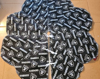 Las Vegas Raiders table cloth, topper,  tree skirt.  Handmade, quilted,  ribbon closure                                      35" Washable.