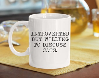 introverted but will discuss cats or dogs 11oz mug