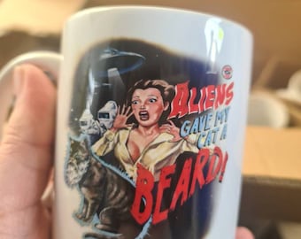 Aliens gave my cat a beard, vintage style movie mug, funny dark humour
