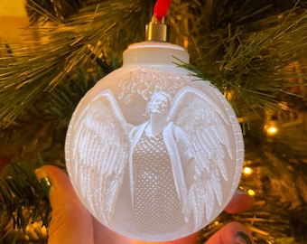 Light up lithophane bauble Christmas tree decoration personalised to suit you.