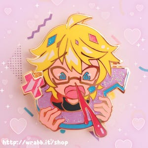 May include: A gold-colored enamel pin featuring a cartoon character with yellow hair, wearing glasses and a purple shirt. The character is biting into a purple donut with pink frosting and red sprinkles. The character has a red nosebleed.