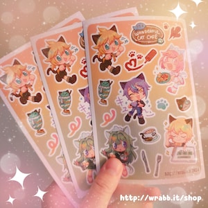 May include: A set of three sticker sheets featuring colorful illustrations of cats, desserts, and other cute characters. The stickers are printed on white paper with a glossy finish. The sheets are labeled "It's a Wonderful Cat Cafe".