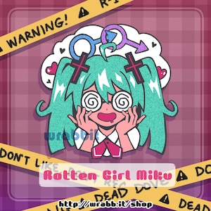 May include: A sticker featuring a cartoon character with teal twin-tail hair, spiral eyes, and a pink mouth. The character wears black cross hair clips and is surrounded by gender symbols and hearts. The text reads Rotten Girl Miku and wrabb.it/shop.