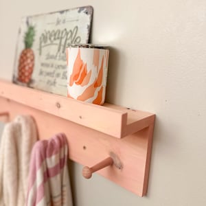 Wood Floating Shelf with Pegs: Entryway Coat Rack