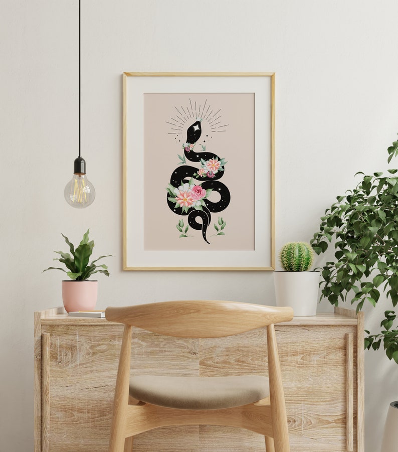 May include: A black snake with a star-filled body is coiled around pink and white flowers. The snake is facing upwards with its head raised. The background is a light beige color.
