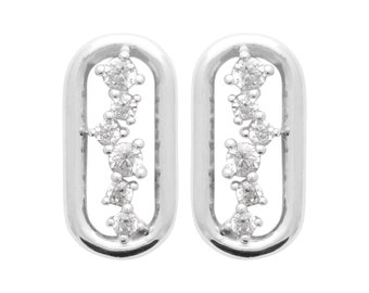 May include: A pair of silver earrings with a rectangular shape and a row of small, clear stones.