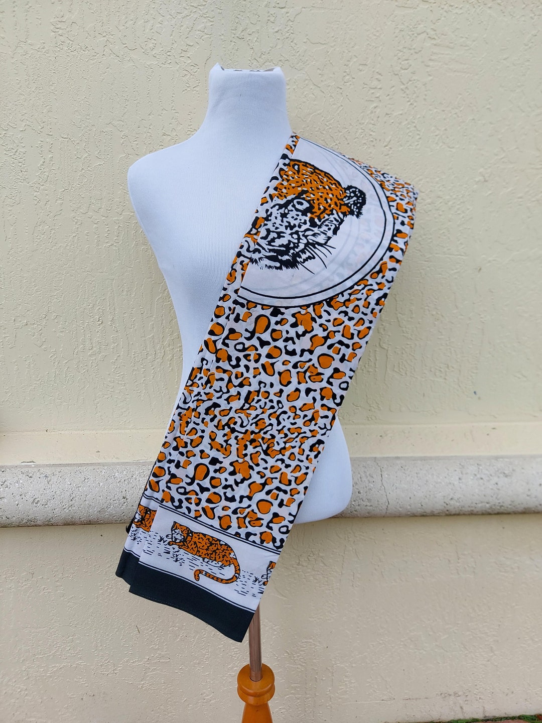 Orange Leopard Ibhayi. Idlozi Fabric. African Spirituality Fabric