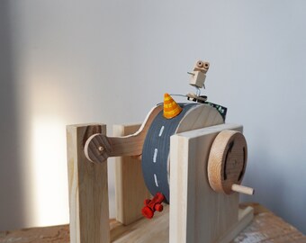 Robot going on the wooden automaton skateboard