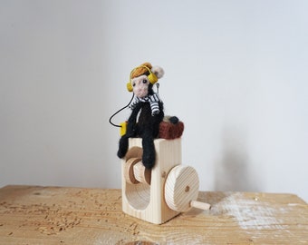 Monkey with suitcase listening to music wooden automaton