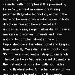May include: A silver watch with a black leather strap and a white face. The watch has a moonphase complication and is powered by a Felsa 693 movement. The watch is 35 mm in diameter and has a screw-down caseback.