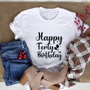 May include: White t-shirt with black text that says "Happy Forty Birthday" with a graphic of balloons and stars.
