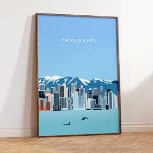May include: A minimalist poster with a blue and white cityscape of Vancouver, British Columbia, with snow-capped mountains in the background. The poster has the word "Vancouver" in white text at the top.