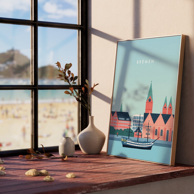 May include: A framed illustration of the city of Bremen, Germany. The illustration features a ship sailing in front of a cityscape with buildings and a church steeple. The text "BREMEN" is printed in the top right corner of the illustration.