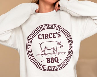 Circe's BBQ - The Odyssey - Grappige Griekse mythologie, uniseks Heavy Blend™-sweater met ronde hals