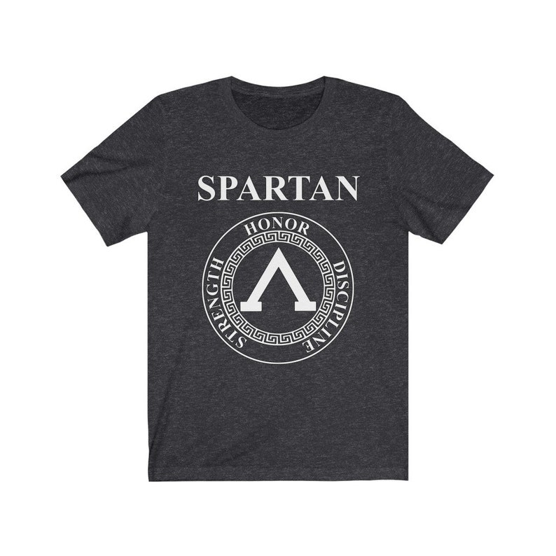 May include: A dark heather grey t-shirt with a white Spartan logo. The logo features a shield with the words "Honor, Strength, Discipline" around it.