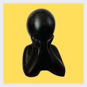 Pensive child resin figure
