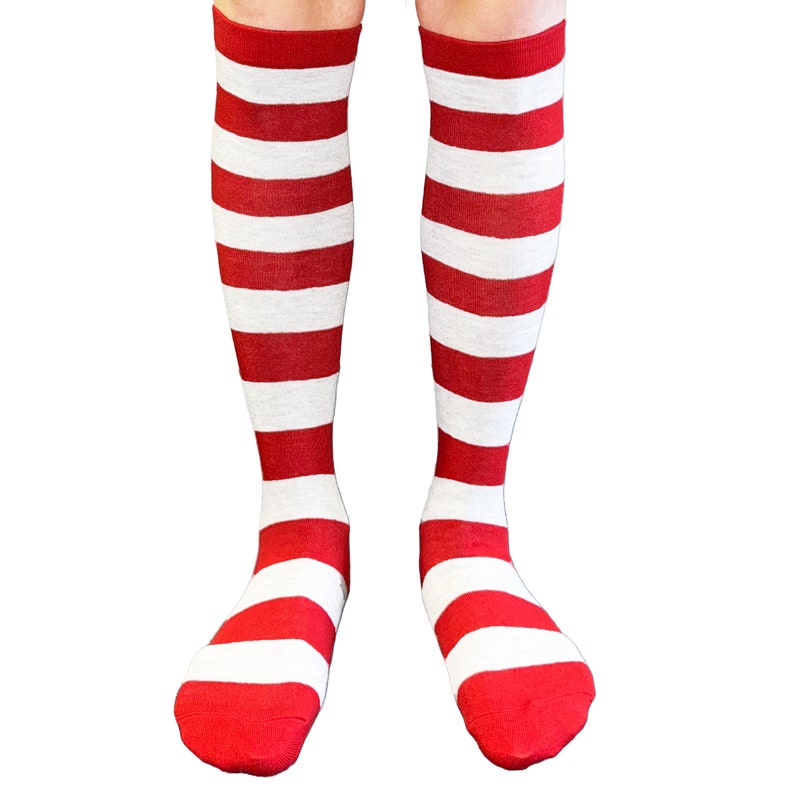May include: A pair of red and white striped knee-high socks.