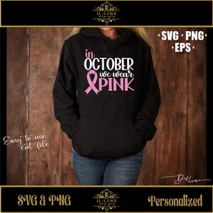 May include: A black hoodie with a pink ribbon and the text "in OCTOBER we wear PINK".