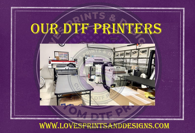 May include: A workshop with two large white DTF printers, a table with boxes, and a sign that reads "Our DTF Printers" in yellow letters. The sign is on a purple background with a white border. The website address "www.lovesprintsanddesigns.com" is at the bottom of the image.