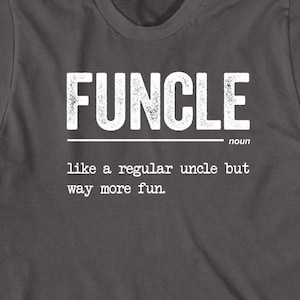 May include: A dark gray t-shirt with the word "FUNCLE" defined as "like a regular uncle but way more fun."