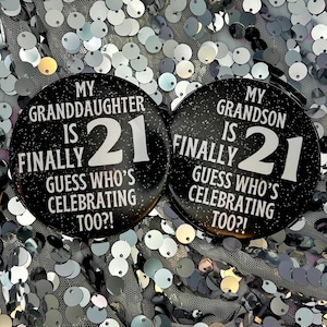 May include: Two black and white button pins with glitter. The text on the pins reads "My Granddaughter is Finally 21 Guess Who's Celebrating Too?!" and "My Grandson is Finally 21 Guess Who's Celebrating Too?!"